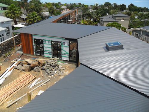 Prospect trc,Mt Eden. Colour steel roof installed, vertical cedar cladding being installed