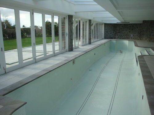 Remuera rd. New pool room, New timber bi-fold doors, new glass roof