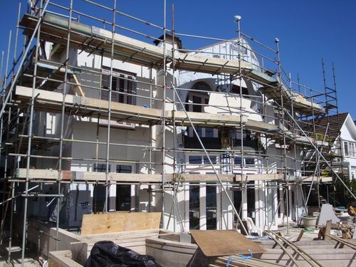 Paritai dr, Orakei. Full scale leaky home repair. New cavity system and eterpan cladding being installed.