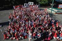 Pupils at Belmont School celebrate the final day of carton collecting.