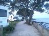 takapuna holiday camp from the walking track along the beach .
