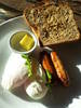 Free range eggs on grainy toast with a side of salumeria pork & fennel sausage